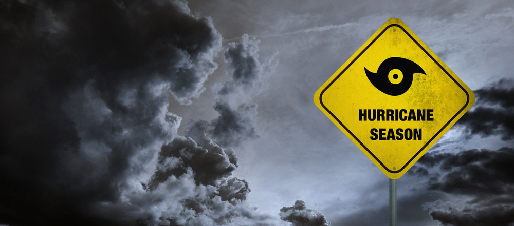 Hurricane season banner with storm clouds background - article about specialty oil supply chain security